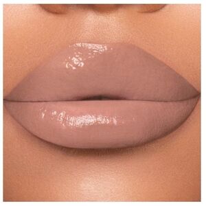 Jeffree Star Supreme Gloss color Naked In The Dark, light nude w grey tones